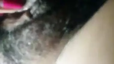 Cute girl showing her hairy pussy