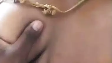 Stepson squeezes his stepmom’s big boob in nude MMS